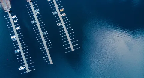 Boats in dock at LUT University campus at lake Saimaa