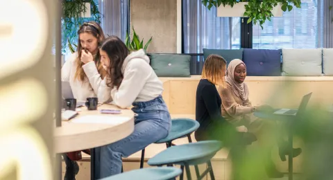 International students studying in lobby at LUT University