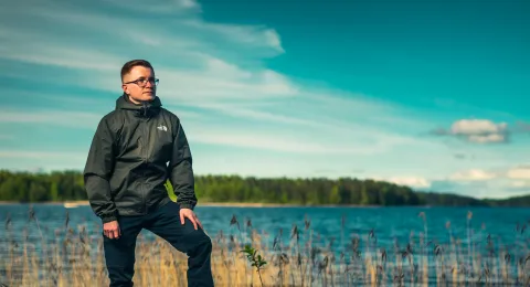 LUT University student standing on the shore