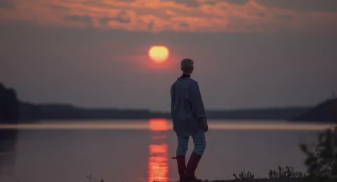 LUT University student watching the sunset