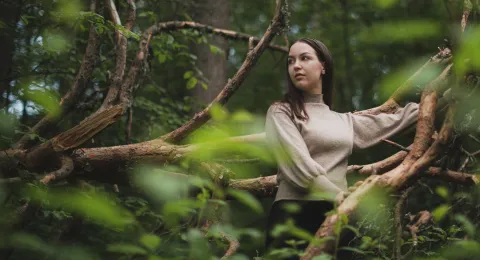 LUT University student walking in the woods