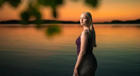 LUT University, The first joint application round in 2025 starts. LUT University's students is standing by the lake Saimaa in sunset.