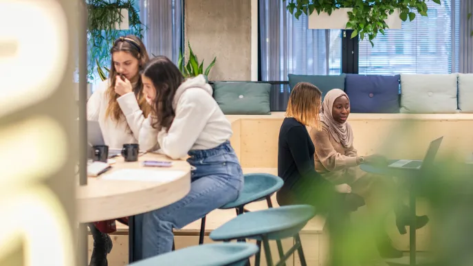 International students studying in lobby at LUT University