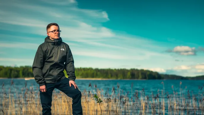 LUT University student standing on the shore