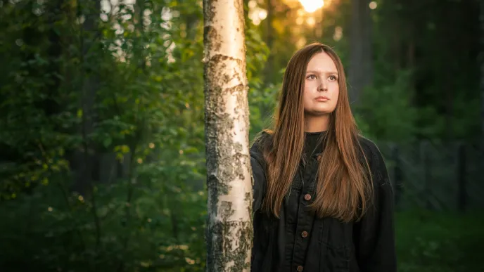 LUT University student walking in forest