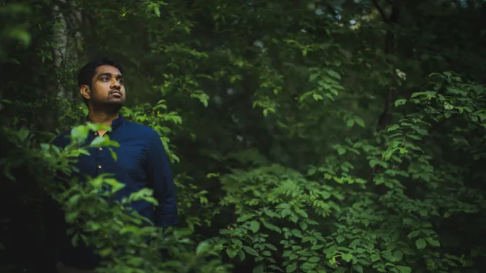 LUT University student walking in the forest