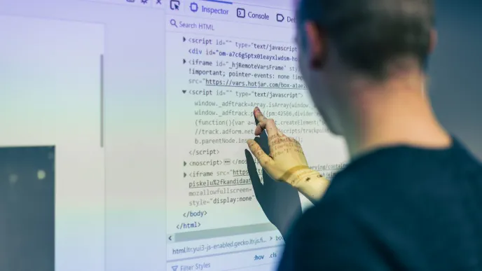 Student coding in LUT University laboratory