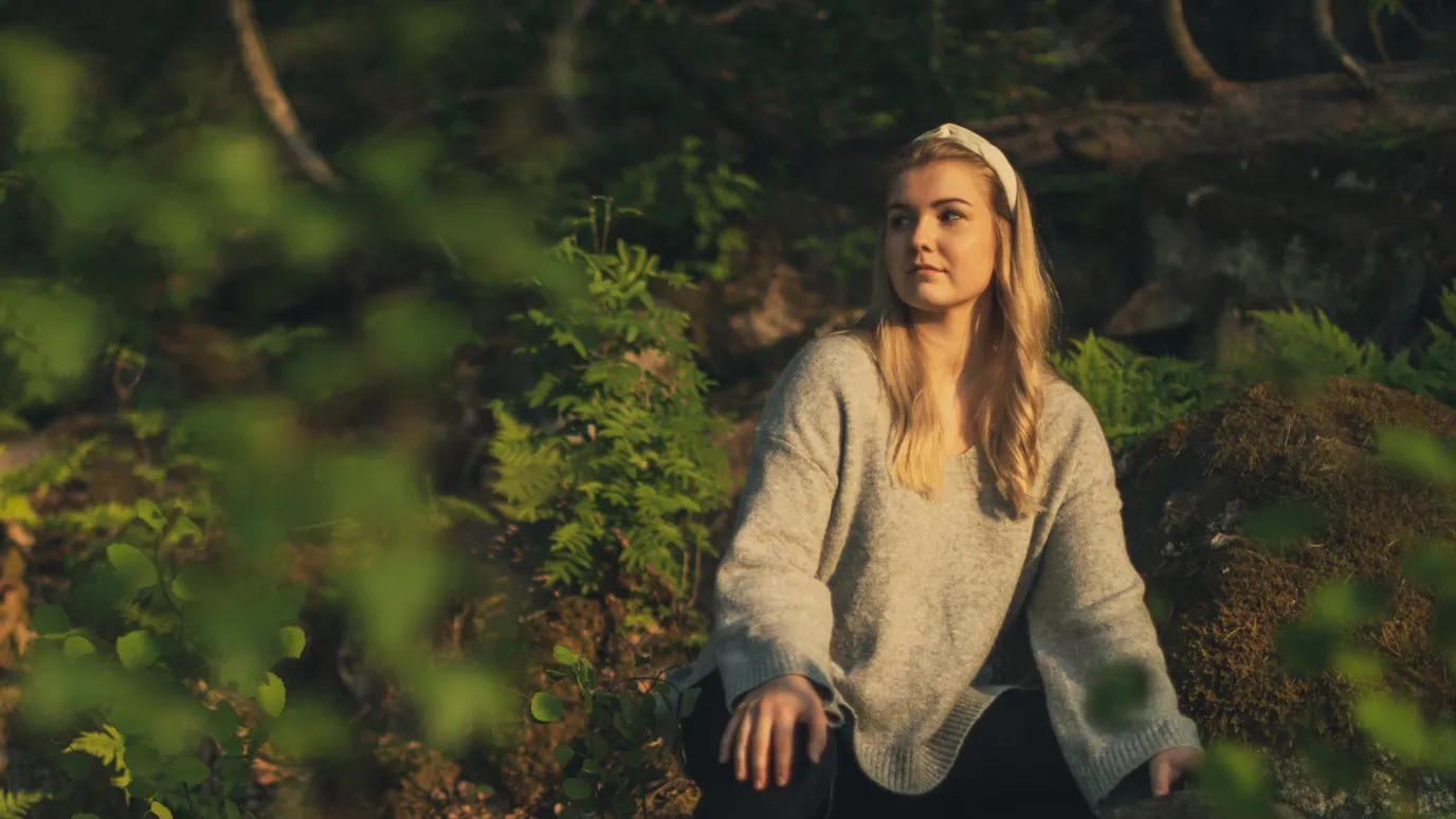 LUT University master's student in a forest