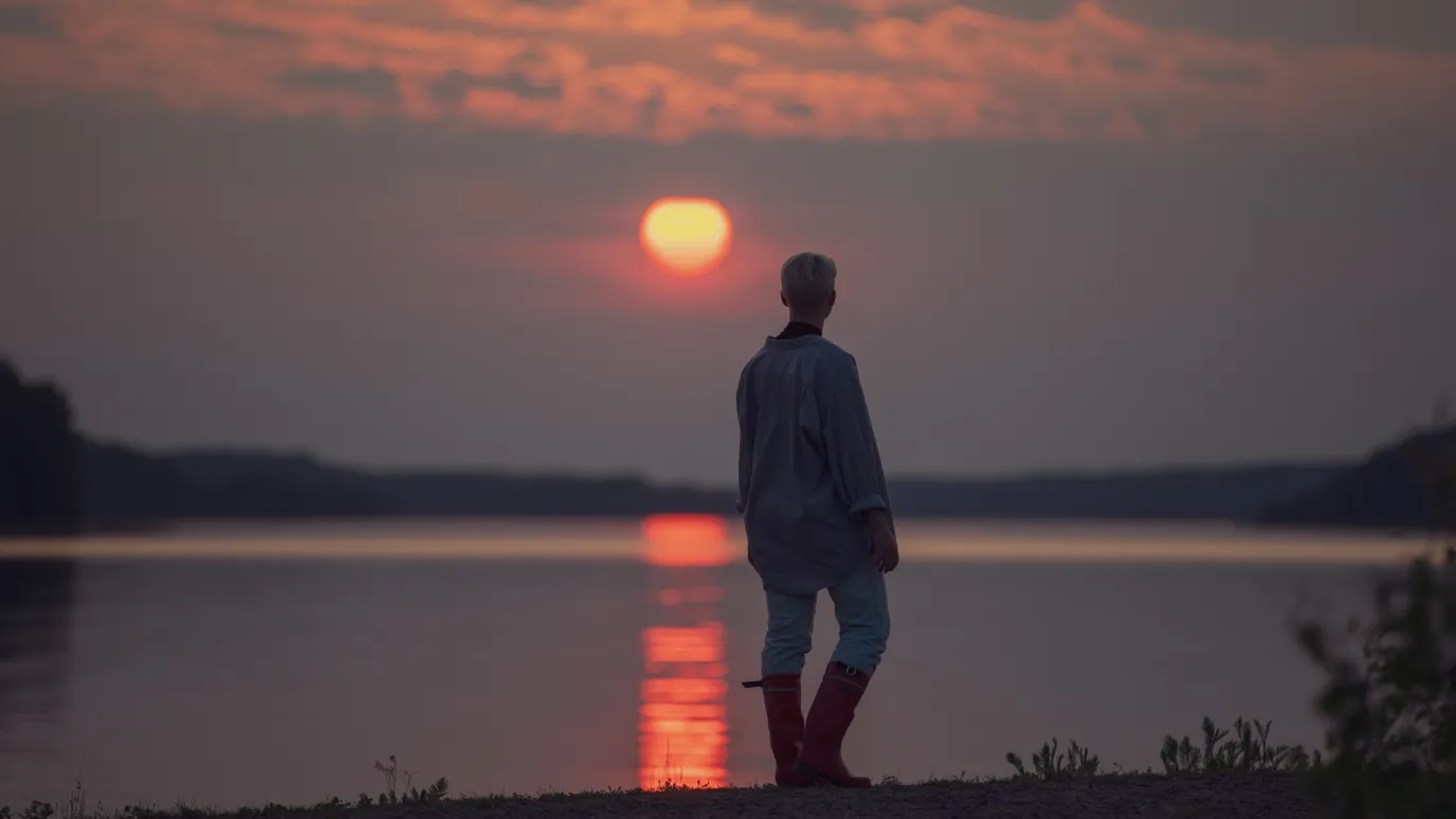 LUT University student watching the sunset